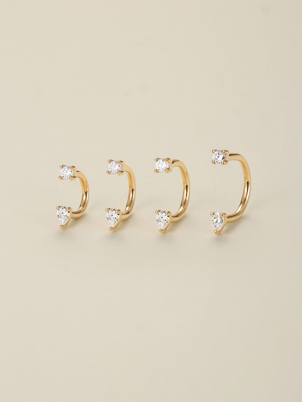 KOSINER 14K Solid Gold Delicate Pear Curved Barbell