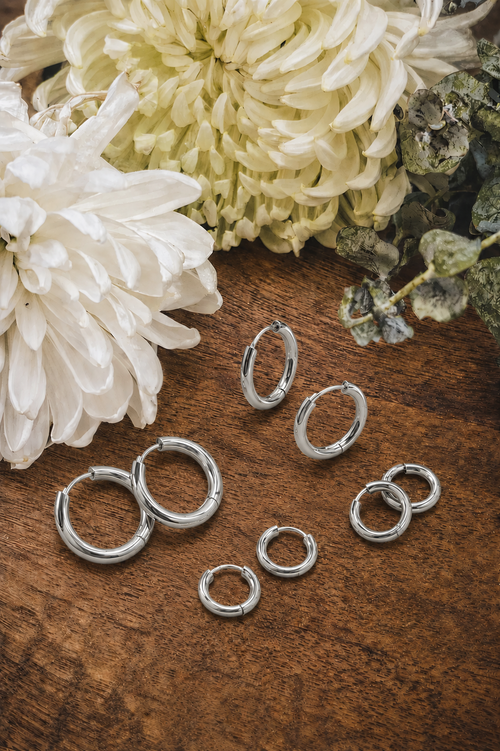 Beautiful 4 Pair Set of Silver Hoop Earrings